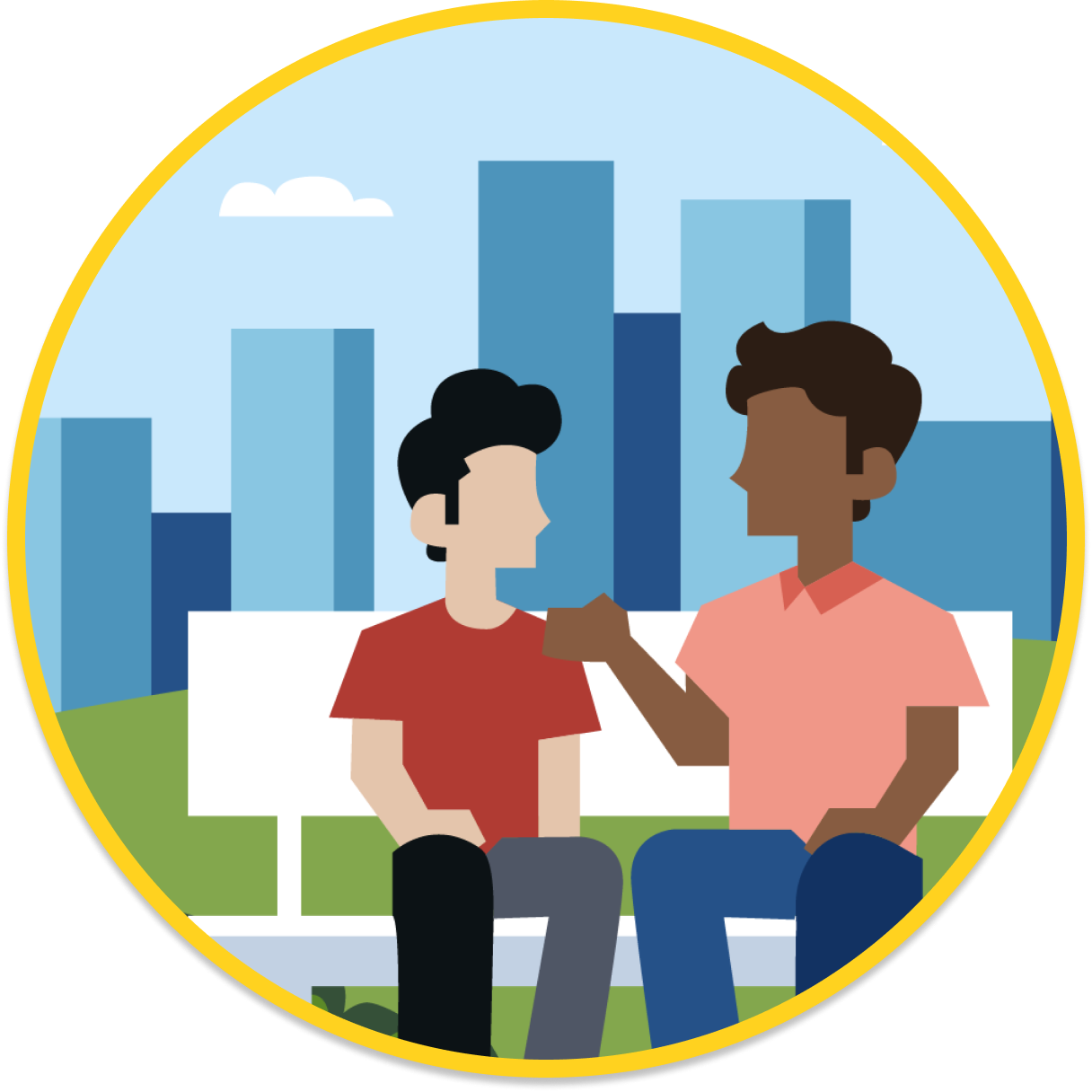 A mentor and young person sitting together on a park bench